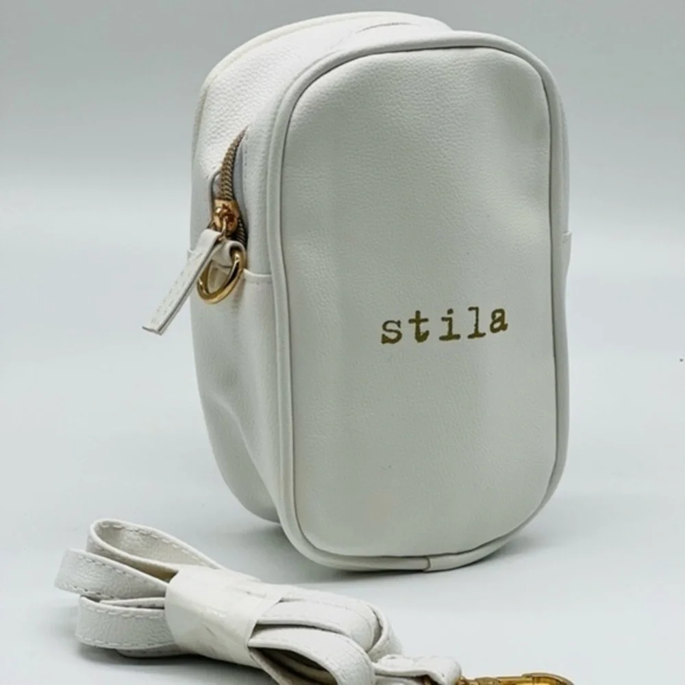 STILA white cosmetic crossbody bag